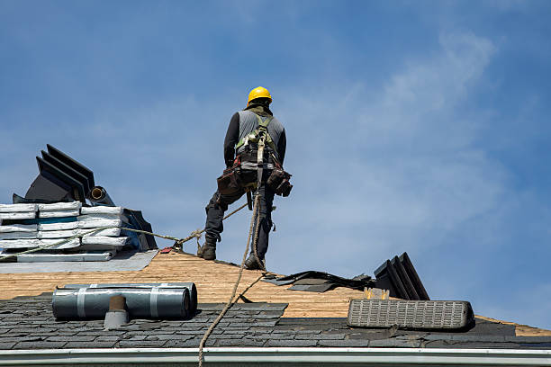 Professional Roof Replacement technician working in Key Biscayne, FL